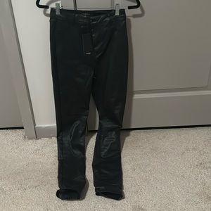 Black leather jeans, size medium